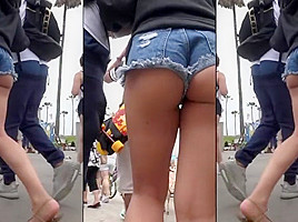 ASIAN ASS CHEEKS HANGING OUT OF SHORTS