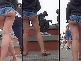 ASIAN ASS CHEEKS HANGING OUT OF SHORTS