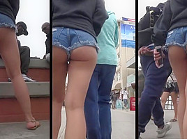 ASIAN ASS CHEEKS HANGING OUT OF SHORTS