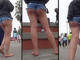 ASIAN ASS CHEEKS HANGING OUT OF SHORTS