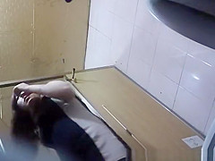 Asian lifts black dress and pee
