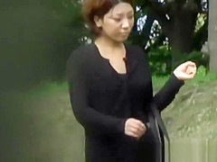 Asian teen 18+ babe secretly filmed upskirt outdoors in public