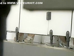 Asian women spied in public toilet peeing