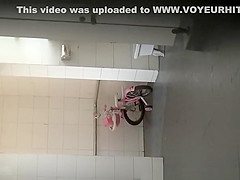 Asian women spied in public toilet peeing