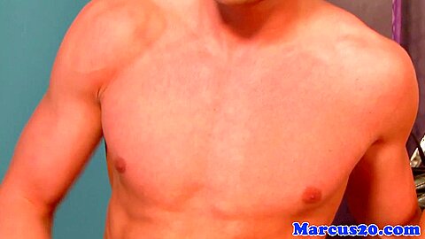 Athletic jock jerking his cock in lockerroom