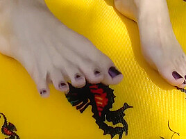 Beautiful Zoe shows her sexy feet at the lake