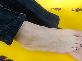 Beautiful Zoe shows her sexy feet at the lake