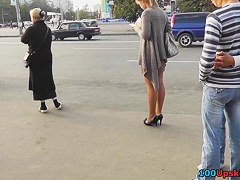 Beautiful upskirt playgirl on a bus stop