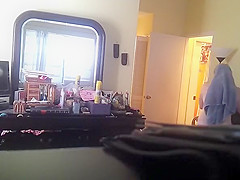 Bedroom concealed camera catches milf