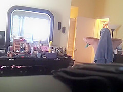 Bedroom concealed camera catches milf