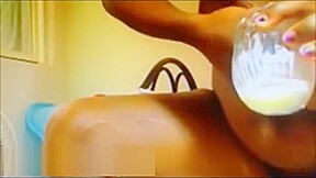 Black babe with huge lactating boobs