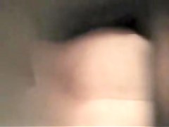 Blonde in changing room with the black bra on tits