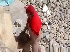 Blowjob and fuck in rocky seashore