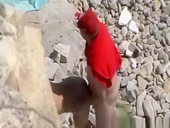 Blowjob and fuck in rocky seashore