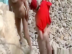 Blowjob and fuck in rocky seashore