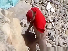 Blowjob and fuck in rocky seashore