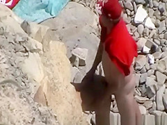 Blowjob and fuck in rocky seashore