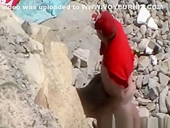 Blowjob and fuck in rocky seashore