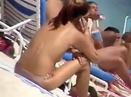 Boobalicious babe at beach topless