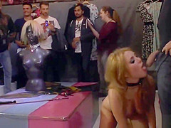 Busty blonde fucked in crowded boutique