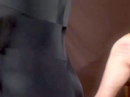 Busty dominatrix in hot caning action