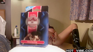 Busty redhead uses a vibrator on her hole