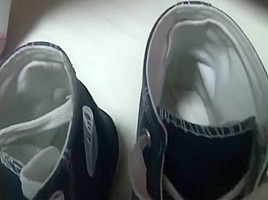 Chinese footjob with socks on pants