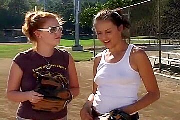 Coach Shows 2 Female Athletes How To Properly Handle A Big Bat