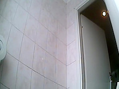 Cute chick peeing in toilet