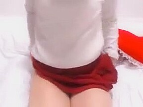 Cute girl in red skirts shows white panties