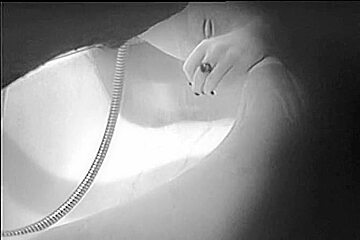 Cute peach taking a hot shower and shaving her pussy
