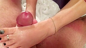 Double footjob with cum on her beautiful toes