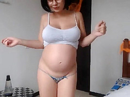 Extremely cute very pregnant big tits