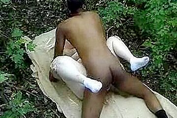 Fat woman taking a big black cock in the woods