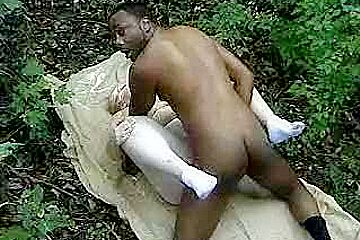 Fat woman taking a big black cock in the woods