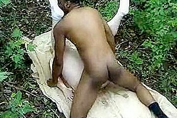 Fat woman taking a big black cock in the woods