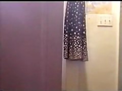 Girl on solo video dresses after shower