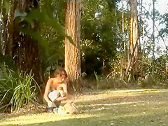 Girl plays in graveyard