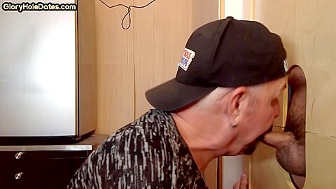 Gloryhole cum loving DILF sucks rod in homemade video