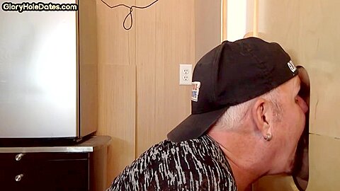 Gloryhole cum loving DILF sucks rod in homemade video
