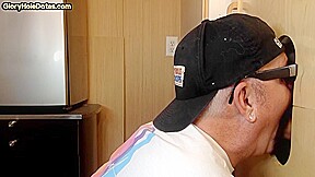 Gloryhole homemade DILF sucks and wanks BFs cock at home
