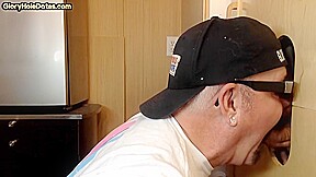 Gloryhole homemade DILF sucks and wanks BFs cock at home