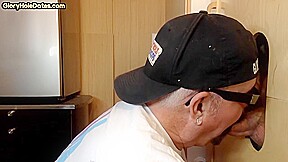 Gloryhole homemade DILF sucks and wanks BFs cock at home