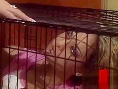 Gorgeous Desert Rose teased by MILF dyke pussy while in cage