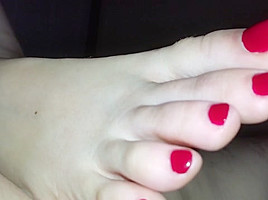 Homemade footjob with huge double cumshot
