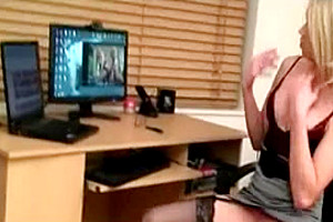 Horny blonde TS watches porn and strokes
