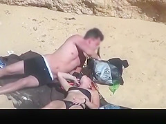 Horny couple fucking in the beach