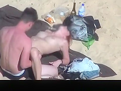 Horny couple fucking in the beach