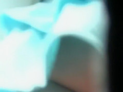 Hot girl in a turqoise short skirt