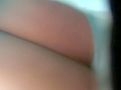 Hot girl in a turqoise short skirt